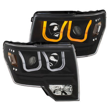 Load image into Gallery viewer, ANZO 2009-2014 Ford F-150 Projector Headlights w/ U-Bar Switchback Black w/ Amber Headlights ANZO
