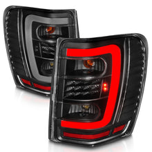Load image into Gallery viewer, ANZO 1999-2004 Jeep Grand Cherokee LED Tail Lights w/ Light Bar Black Housing Clear Lens Tail Lights ANZO
