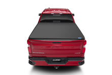 Load image into Gallery viewer, Lund 07-13 Chevy Silverado 1500 (6.5ft. Bed) Genesis Elite Tri-Fold Tonneau Cover - Black Tonneau Covers - Soft Fold LUND
