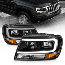 Load image into Gallery viewer, ANZO 99-04 Jeep Grand Cherokee Crystal Headlights - w/ Light Bar Black Housing Headlights ANZO
