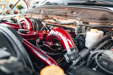 Load image into Gallery viewer, Wehrli wcfWCF100528-FG Wehrli 03-07 Dodge 5.9L Cummins 3.5in Intake Horn &amp; Driver Side Intercooler Pipe Kit - Fluor Green
